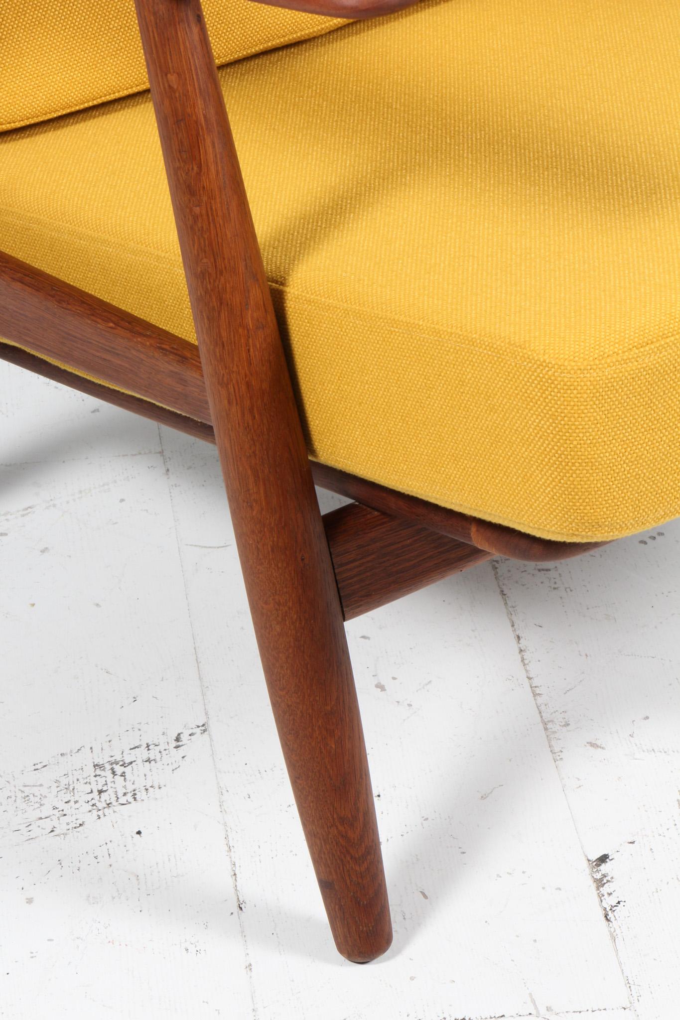Danish Hans J. Wegner, Lounge Chair, Model 240, Oak and teak, 1970s Denmark For Sale
