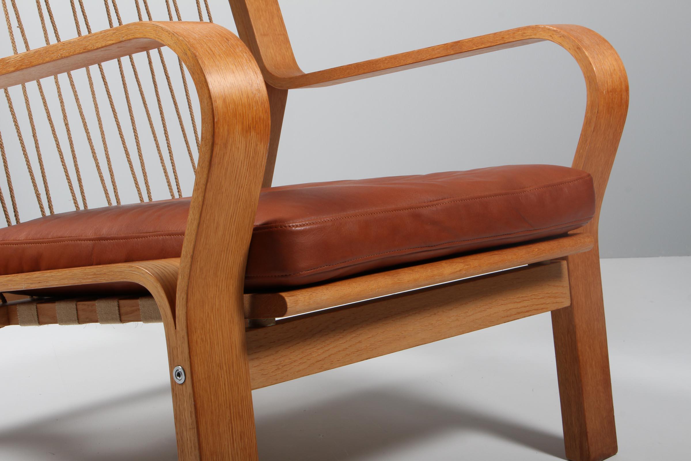Hans J. Wegner, Lounge Chair, Model 671, Oak, Leather and Cotton Rope In Good Condition In Esbjerg, DK