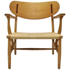 Hans J. Wegner, Lounge Chair Model CH22, Early Edition in Beech and Teak