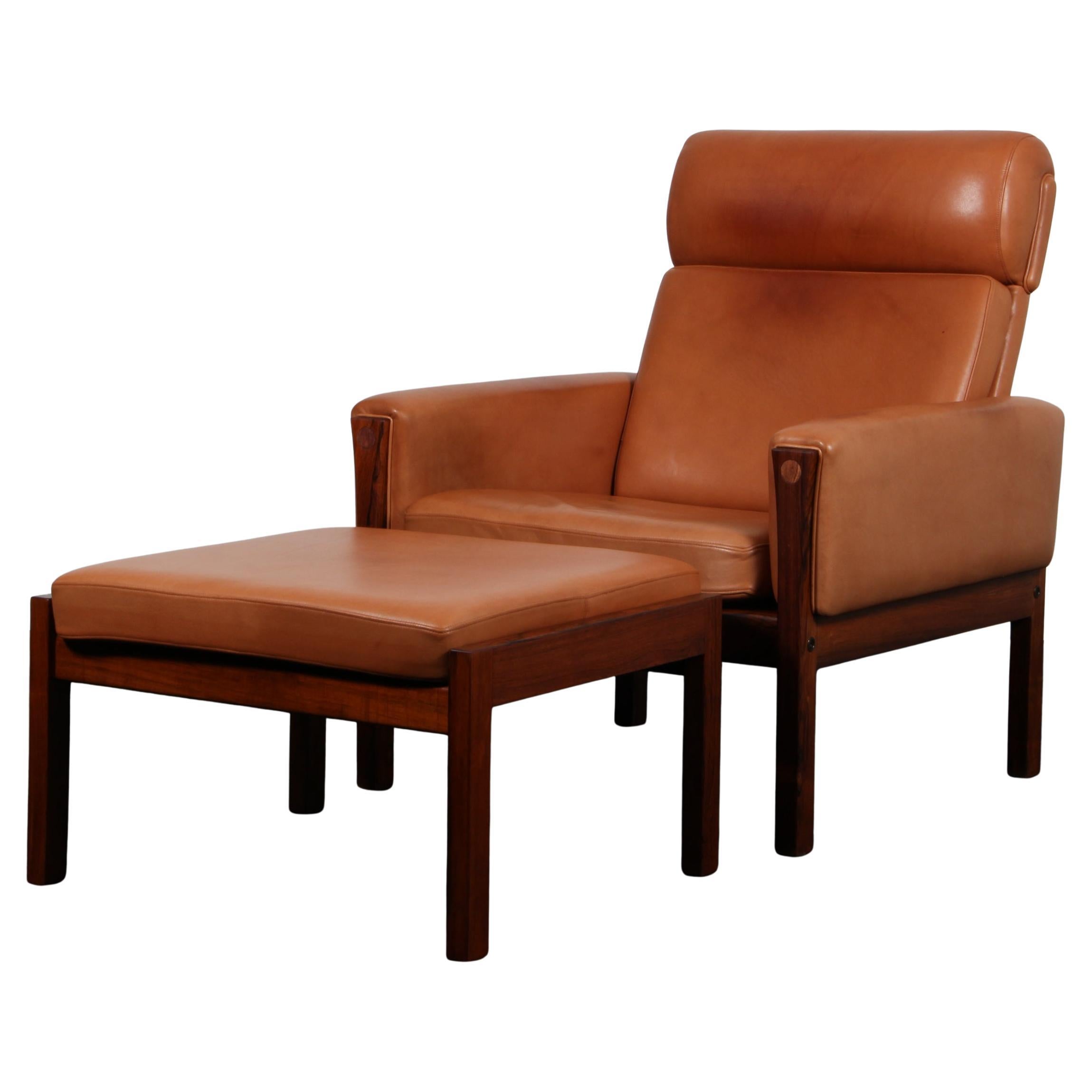 Hans J. Wegner lounge chair with ottoman , Model AP62, Leather, 1960s