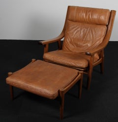 Hans J. Wegner, Lounge chair with ottoman, Model GE530, smoked oak, leather