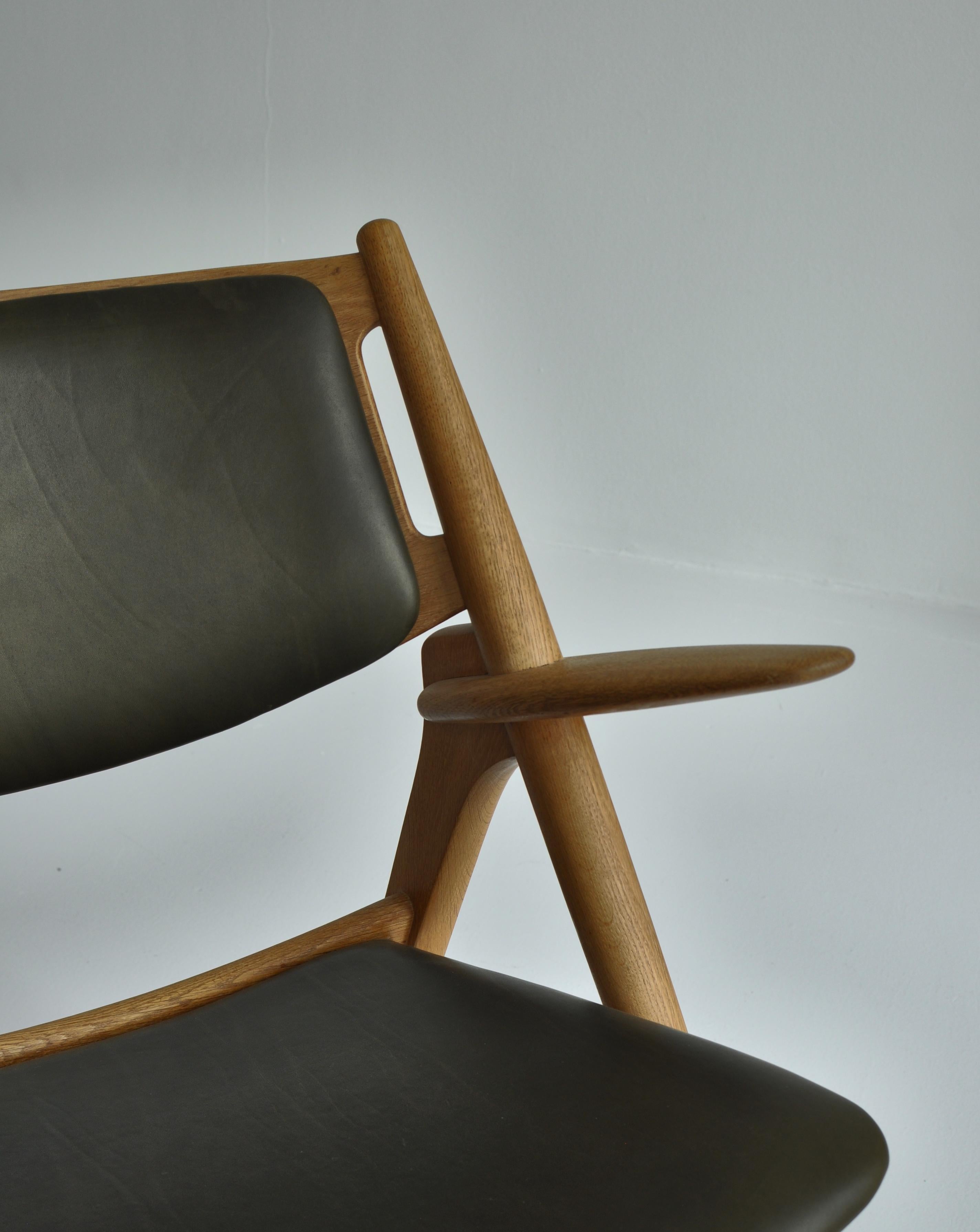 Hans J. Wegner Lounge Chairs from the 1960s in Oak and Dark Green Leather 1