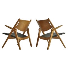 Hans J. Wegner Lounge Chairs aus den 1960er Jahren in Eiche und dunkelgrünem Leder