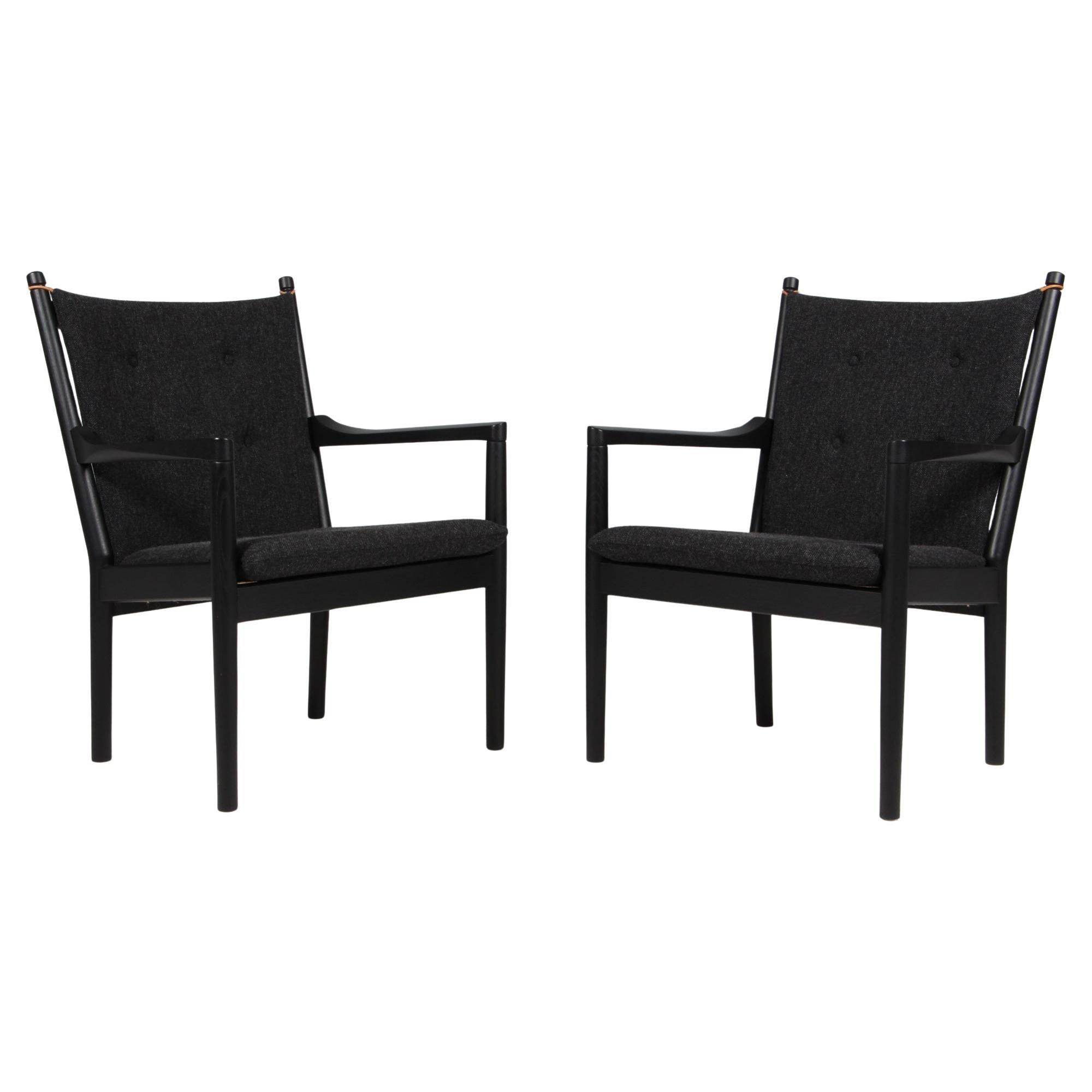Hans J. Wegner Lounge or Armchair, wool and black stained oak. Model 1788