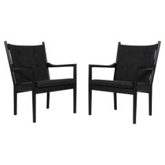 Hans J. Wegner Lounge or Armchair, wool and black stained oak. Model 1788