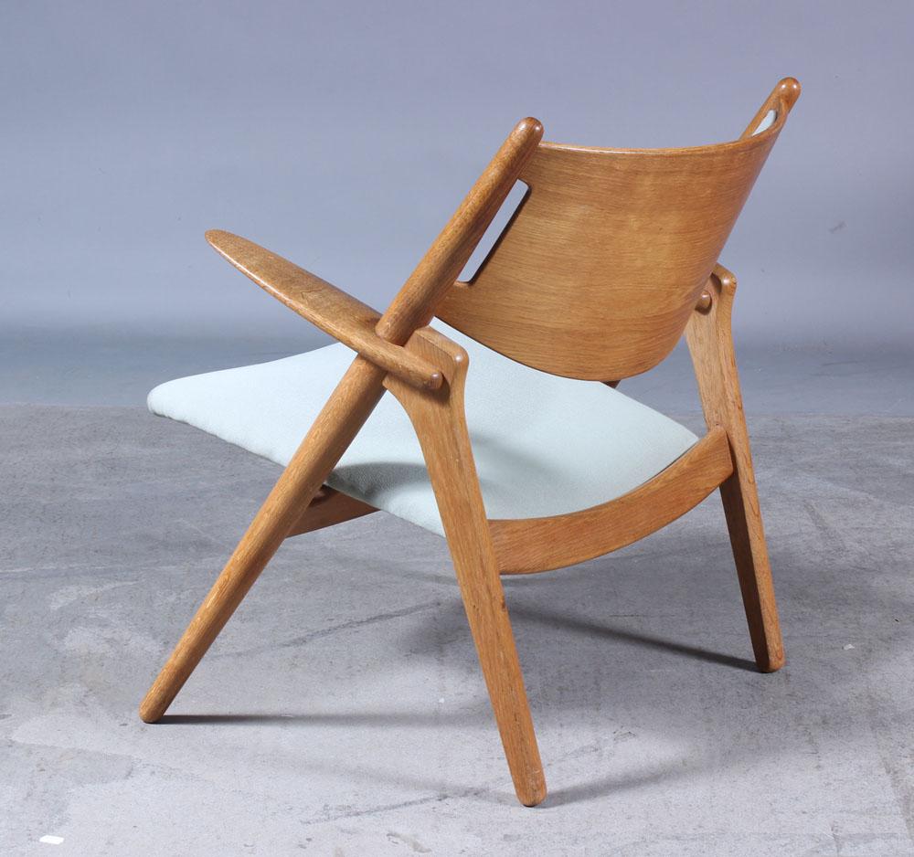 Mid-Century Modern Hans J Wegner fauteuil en chêne modèle Ch 28 Sawbuck pour Carl Hansen, Danemark, années 1960 en vente