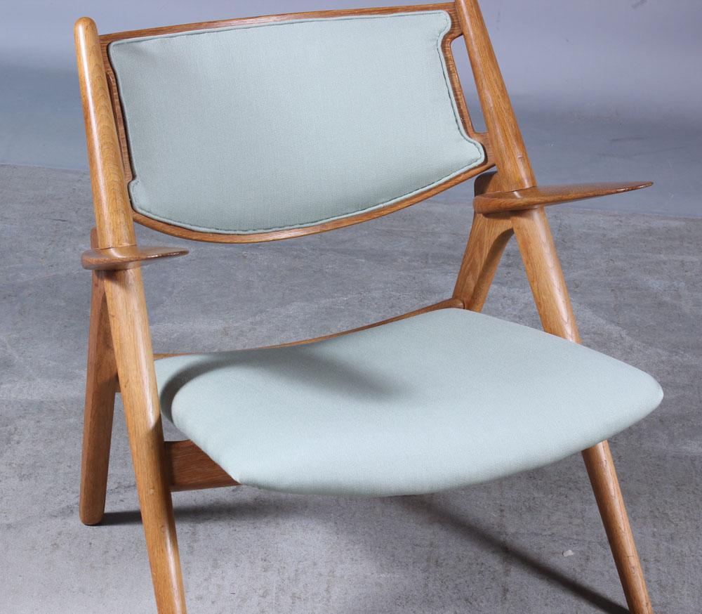 20ième siècle Hans J Wegner fauteuil en chêne modèle Ch 28 Sawbuck pour Carl Hansen, Danemark, années 1960 en vente