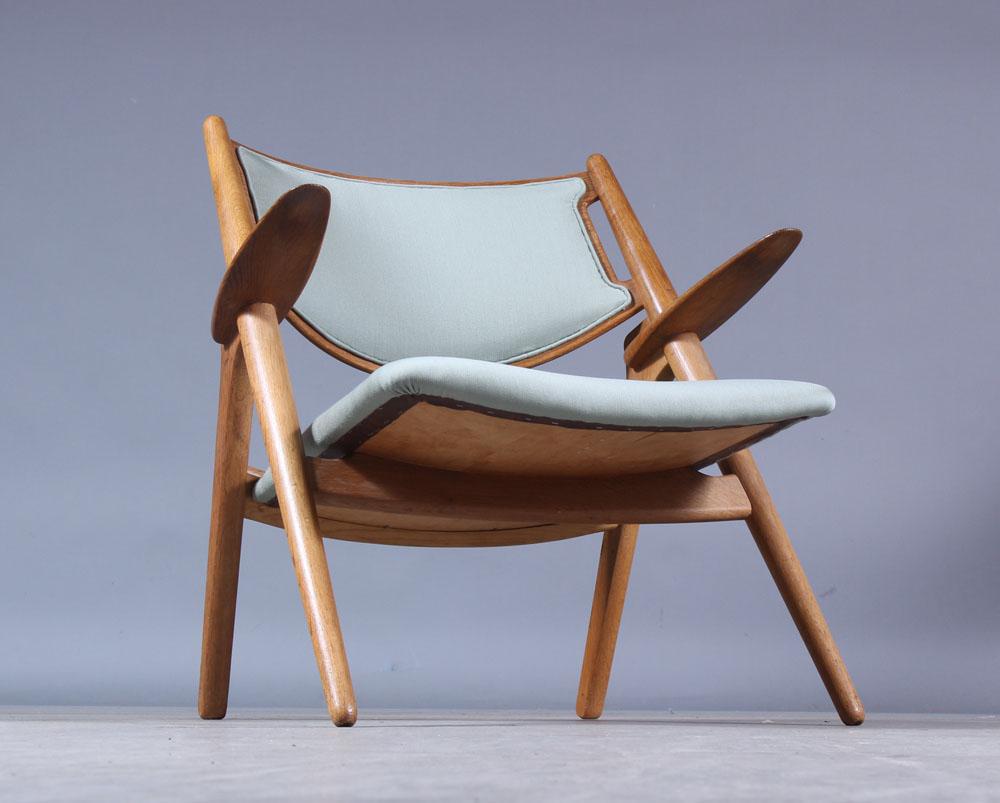 Fabric Hans J Wegner oak armchair Model Ch 28 Sawbuck for Carl Hansen Denmark 1960s For Sale