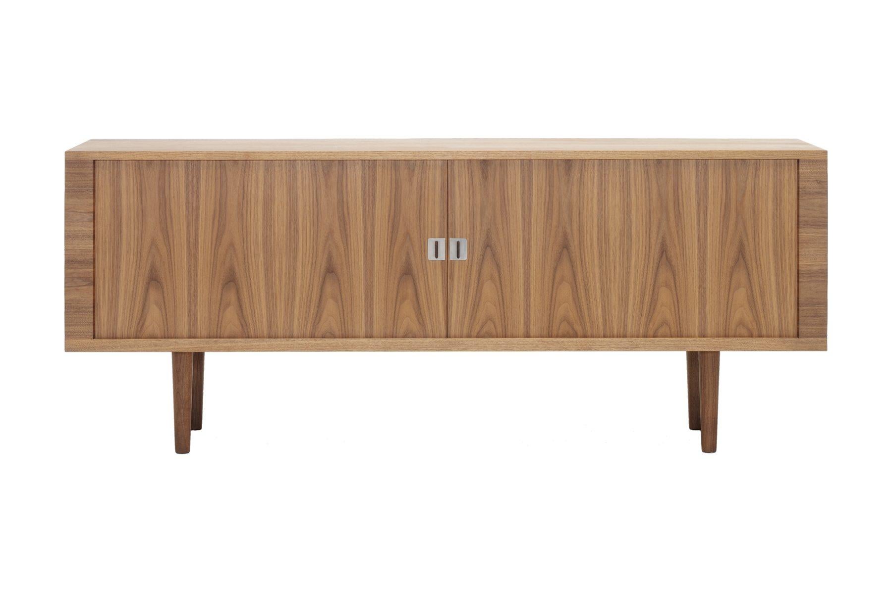 Designed by Hans J. Wegner’ in 1959, the bold CH825 credenza exudes modern simplicity. This highly functional and appealing piece reveals multiple sophisticated features upon closer inspection.

 