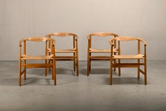 Hans J. Wegner, Modell PP201, Esszimmerstühle aus Eiche mit Sitzflächen aus Papierkordel, PP Møbler