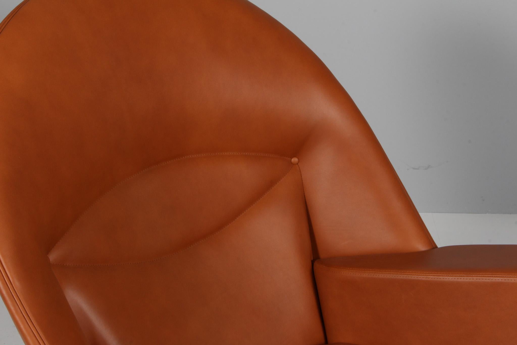 Contemporary Hans J. Wegner Oculus Lounge Chair and ottoman in Full grain walnut leather