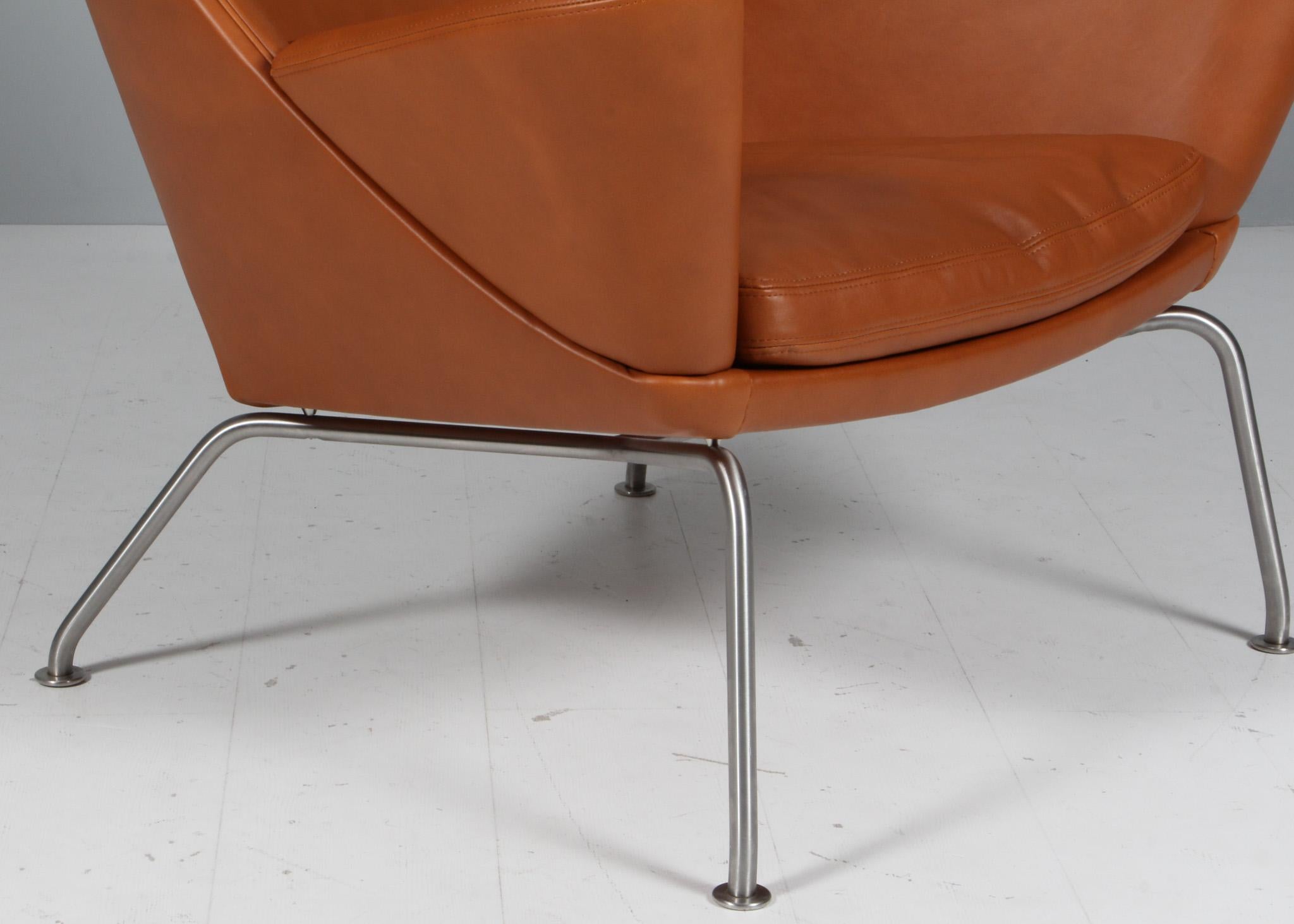 Hans J. Wegner Oculus Lounge Chair and ottoman in Full grain walnut leather 1