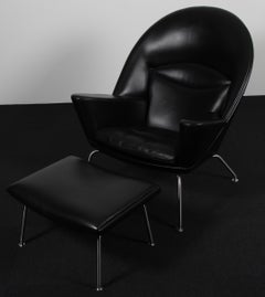 Hans J. Wegner Oculus Lounge Chair and ottoman in original leather upholstery