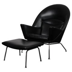 Hans J. Wegner Oculus Lounge Chair and ottoman in original leather upholstery