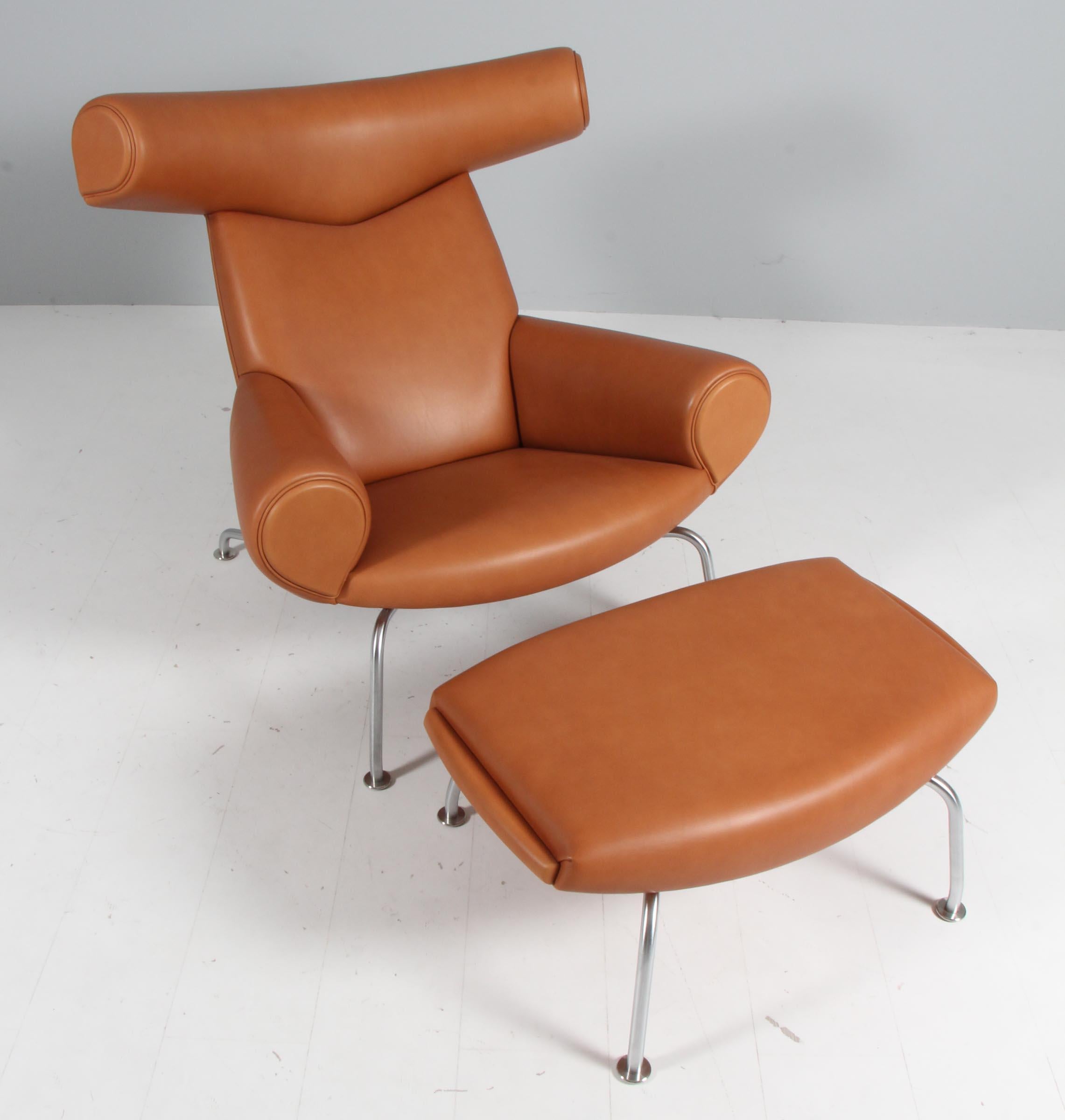 An immortal classic, the EJ-100, Ox chair with ottoman, was designed by Hans J. Wegner in 1960, and is regarded as one of Wegners more important chairs. It was Wegner's fascination with Picasso that inspired him to do this sculptural and powerful