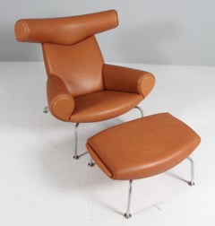 Hans J. Wegner Silla Buey y otomana Modelo EJ 100, Nogal Elegance plena flor