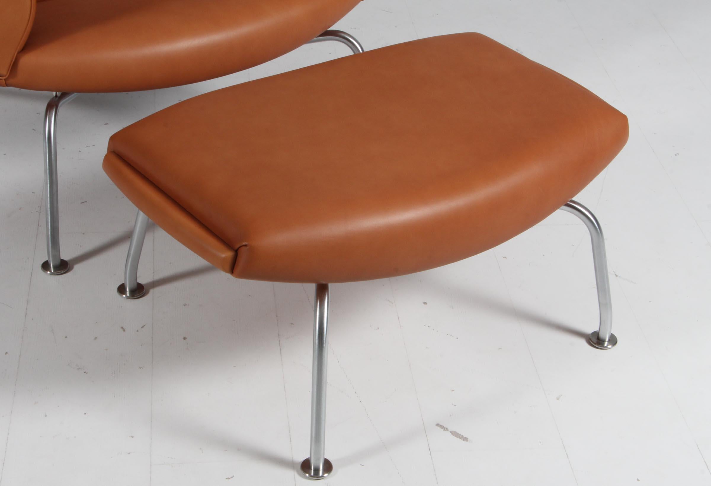 Scandinavian Modern Hans J. Wegner Ox Chair and ottoman Model EJ 100, Walnut Elegance full grain