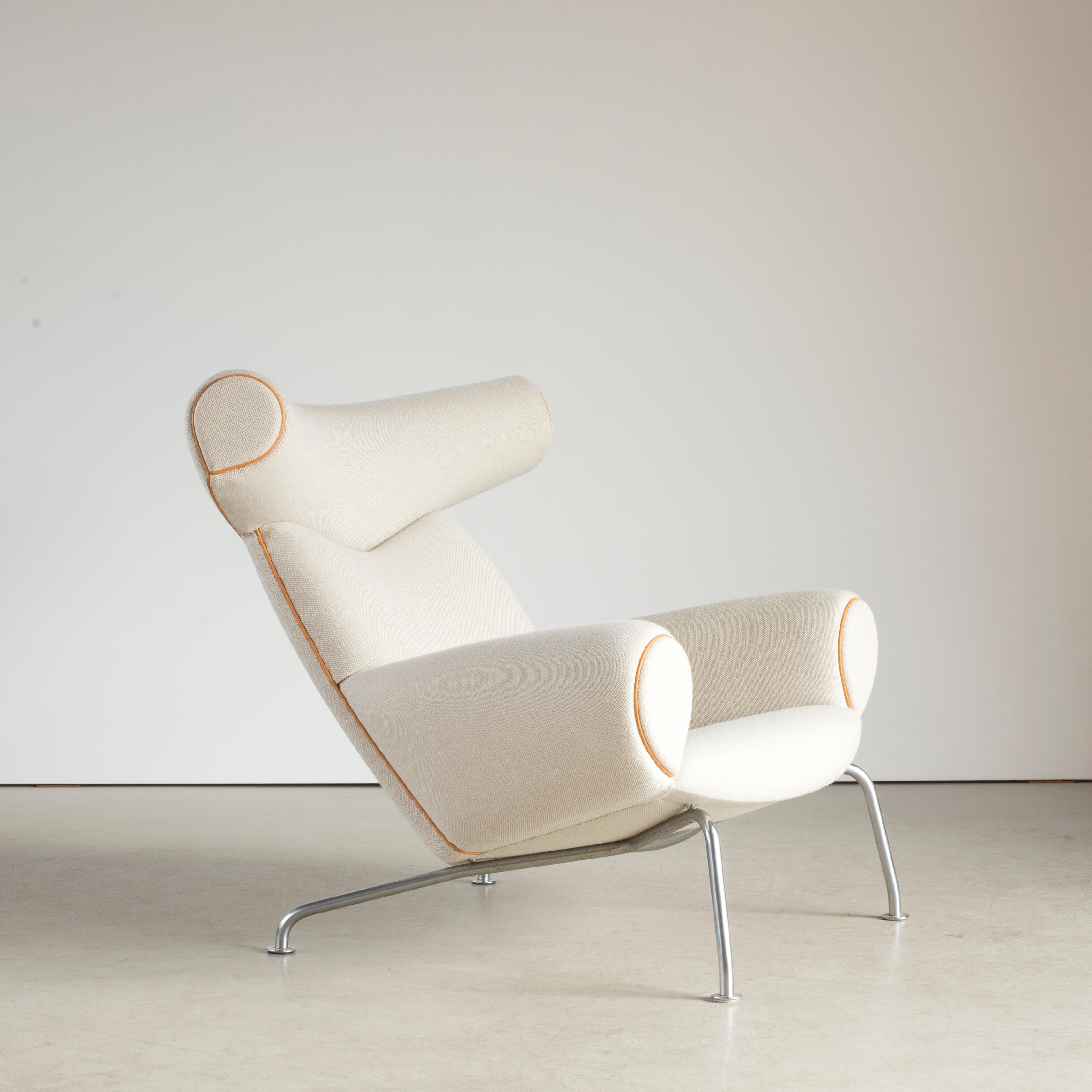 Hans J. Wegner 'Ox-chair' model AP-46. Easy chair with tubular steel frame. Sides, seat and back upholstred with light fabric with leather edgings.

Executed by AP-Stolen, Copenhagen, Denmark.