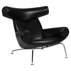 Silla Buey Hans J. Wegner Modelo EJ 100, cuero original negro