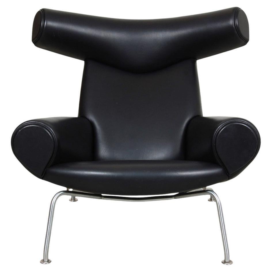 Hans J. Wegner Ox Chair Patinierter Loungesessel aus schwarzem Anilinleder
