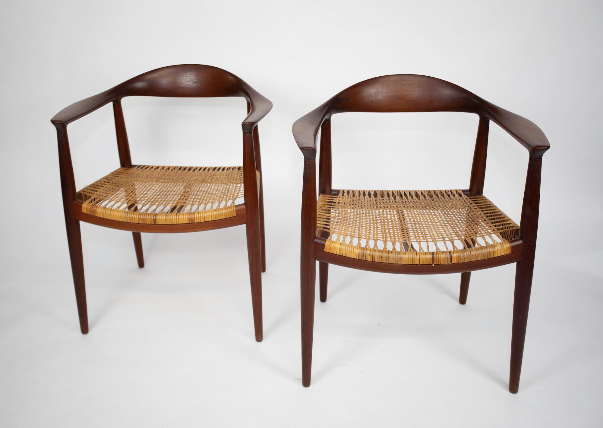 A matched pair of classic chairs.
Original Cane seats
Original surface
Branded signature.