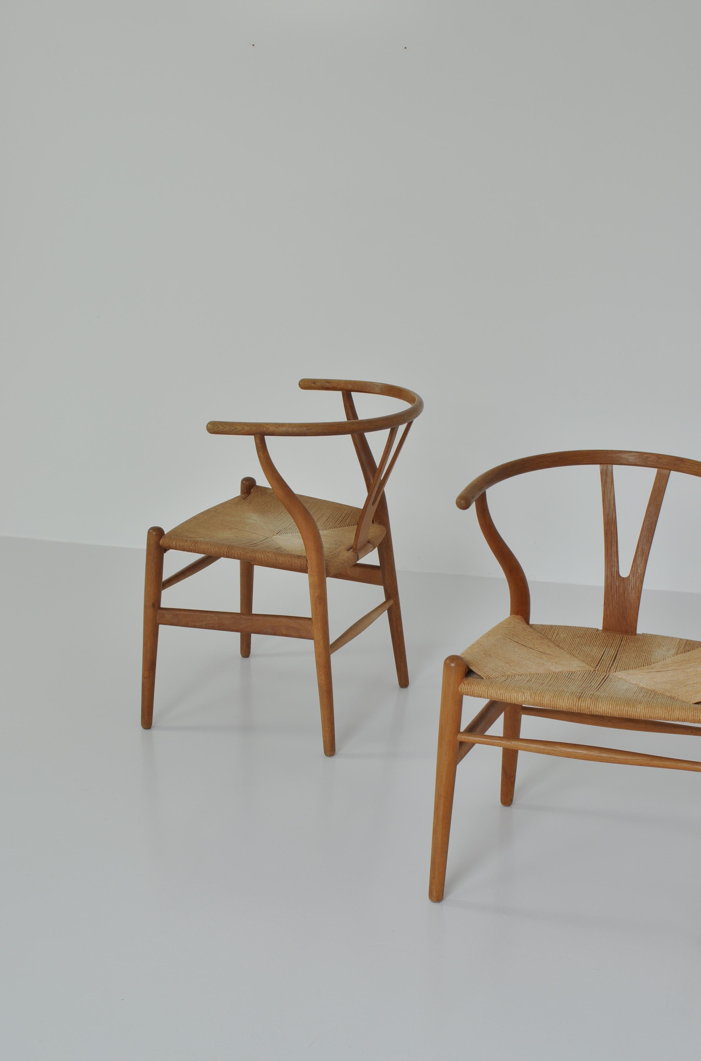 Hans J. Wegner Pair of Early Stamped Carl Hansen & Sons Wishbone Chairs, 1950s 8