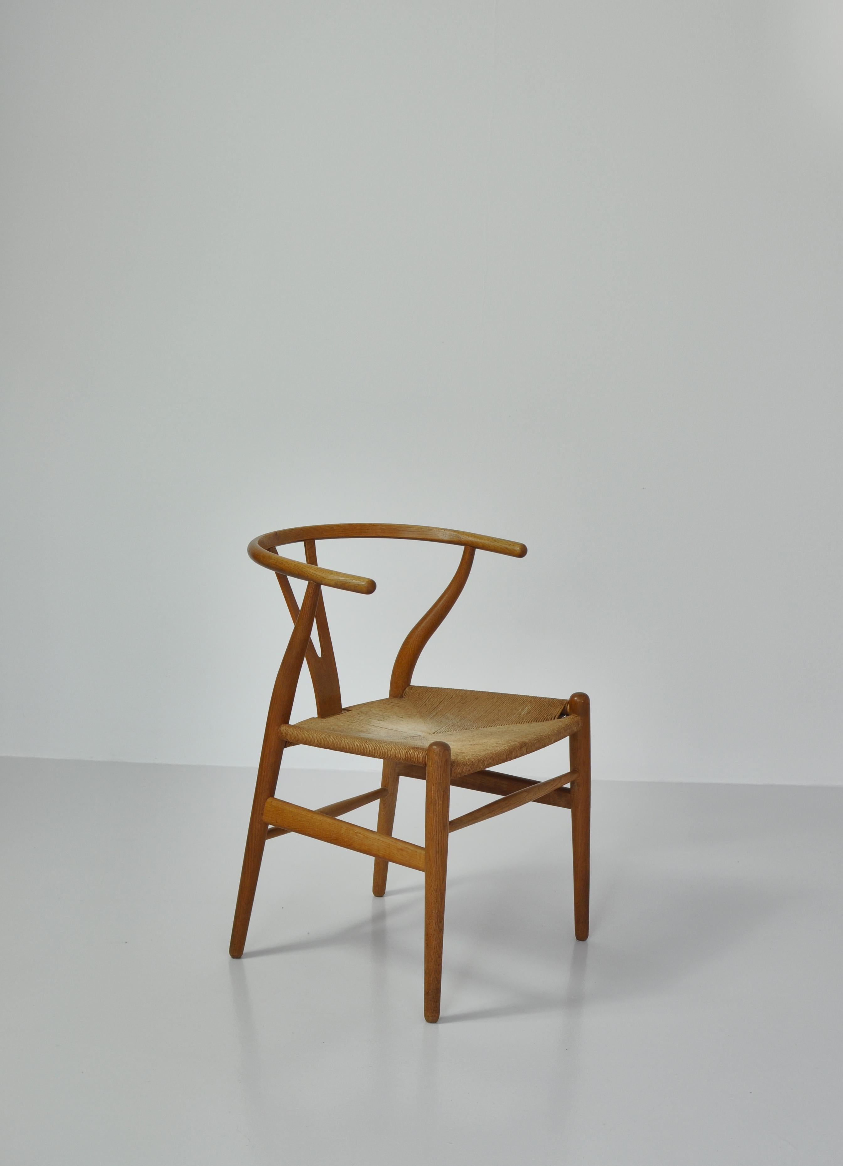 Scandinavian Modern Hans J. Wegner Pair of Early Stamped Carl Hansen & Sons Wishbone Chairs, 1950s