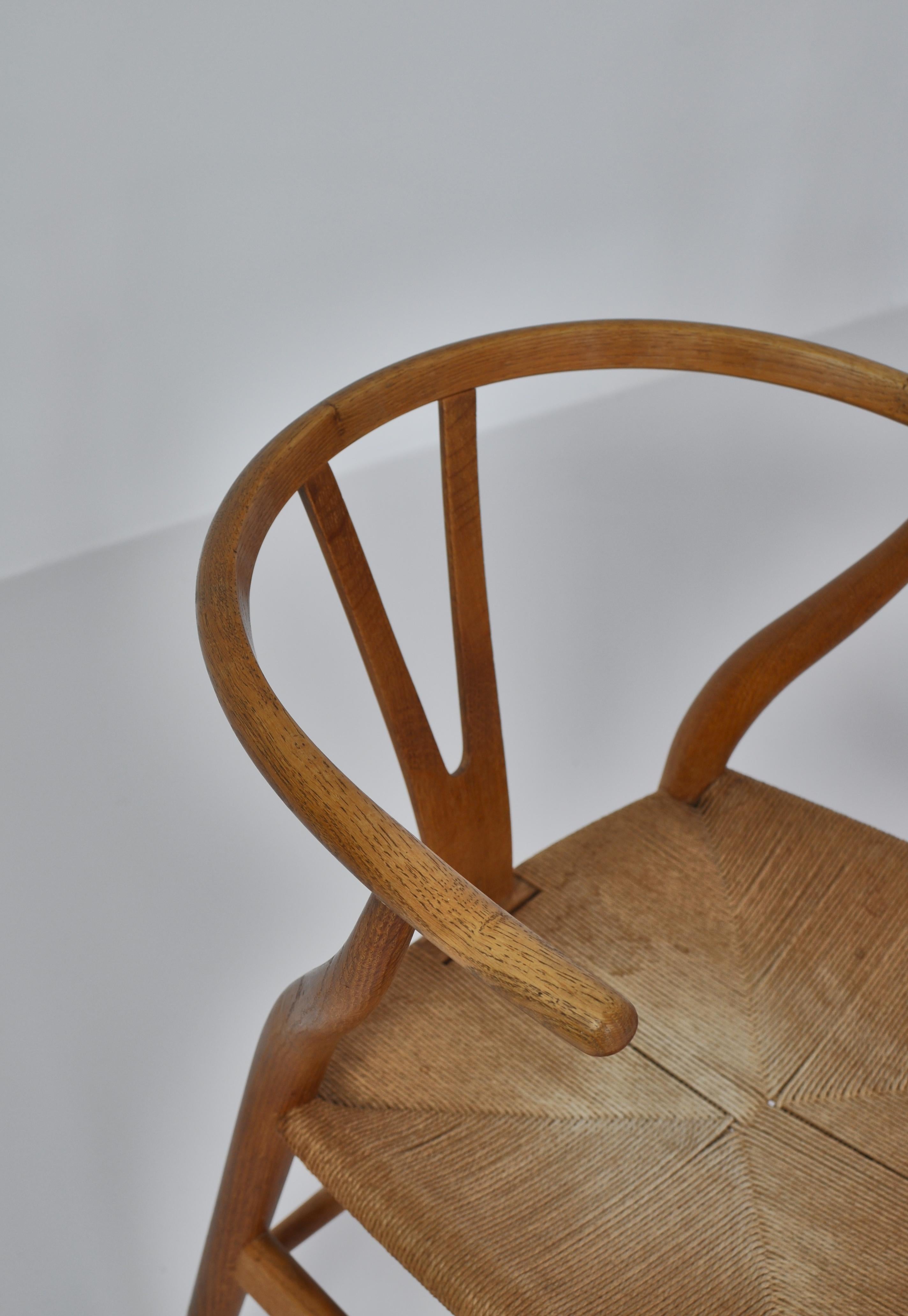 Danish Hans J. Wegner Pair of Early Stamped Carl Hansen & Sons Wishbone Chairs, 1950s