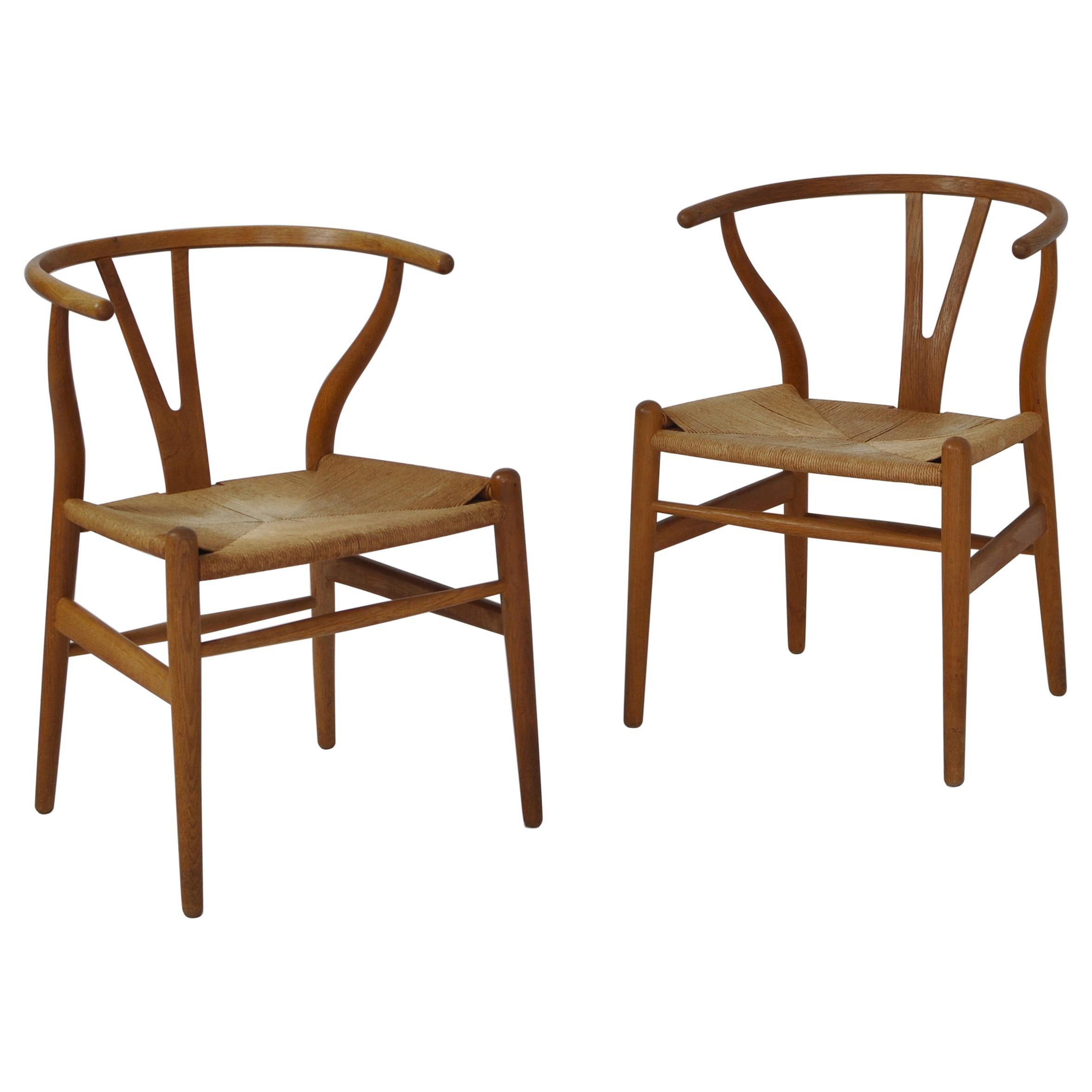 Hans J. Wegner Pair of Early Stamped Carl Hansen & Sons Wishbone Chairs, 1950s