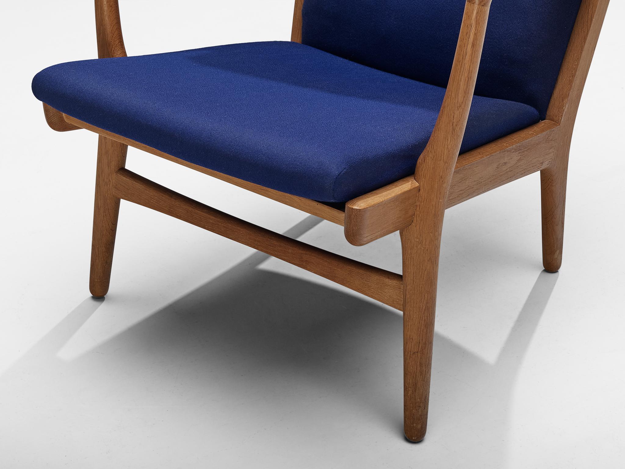 Mid-20th Century Hans J. Wegner Pair of Easy Chairs in Blue Upholstery and Oak For Sale