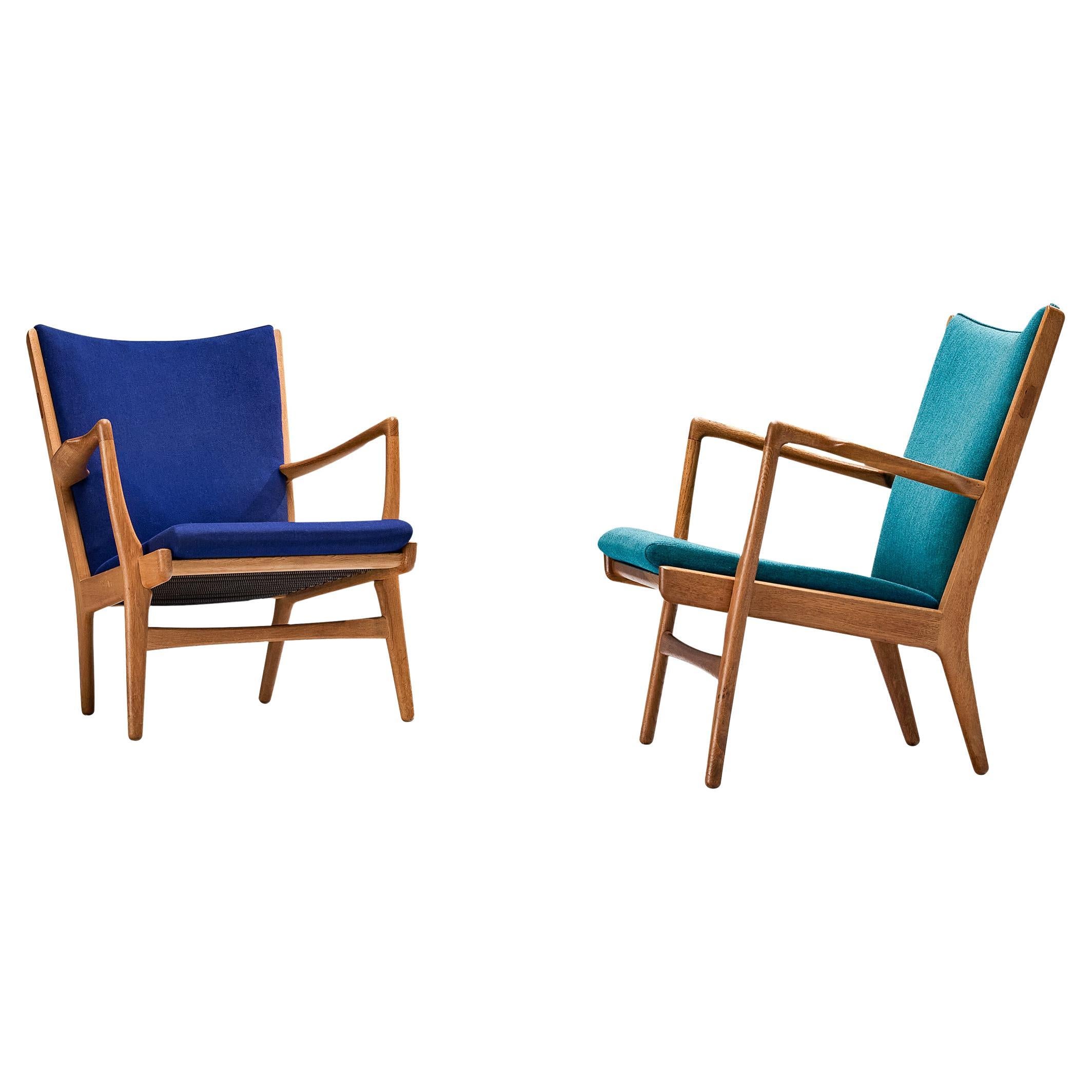 Hans J. Wegner Pair of Easy Chairs in Blue Upholstery and Oak For Sale