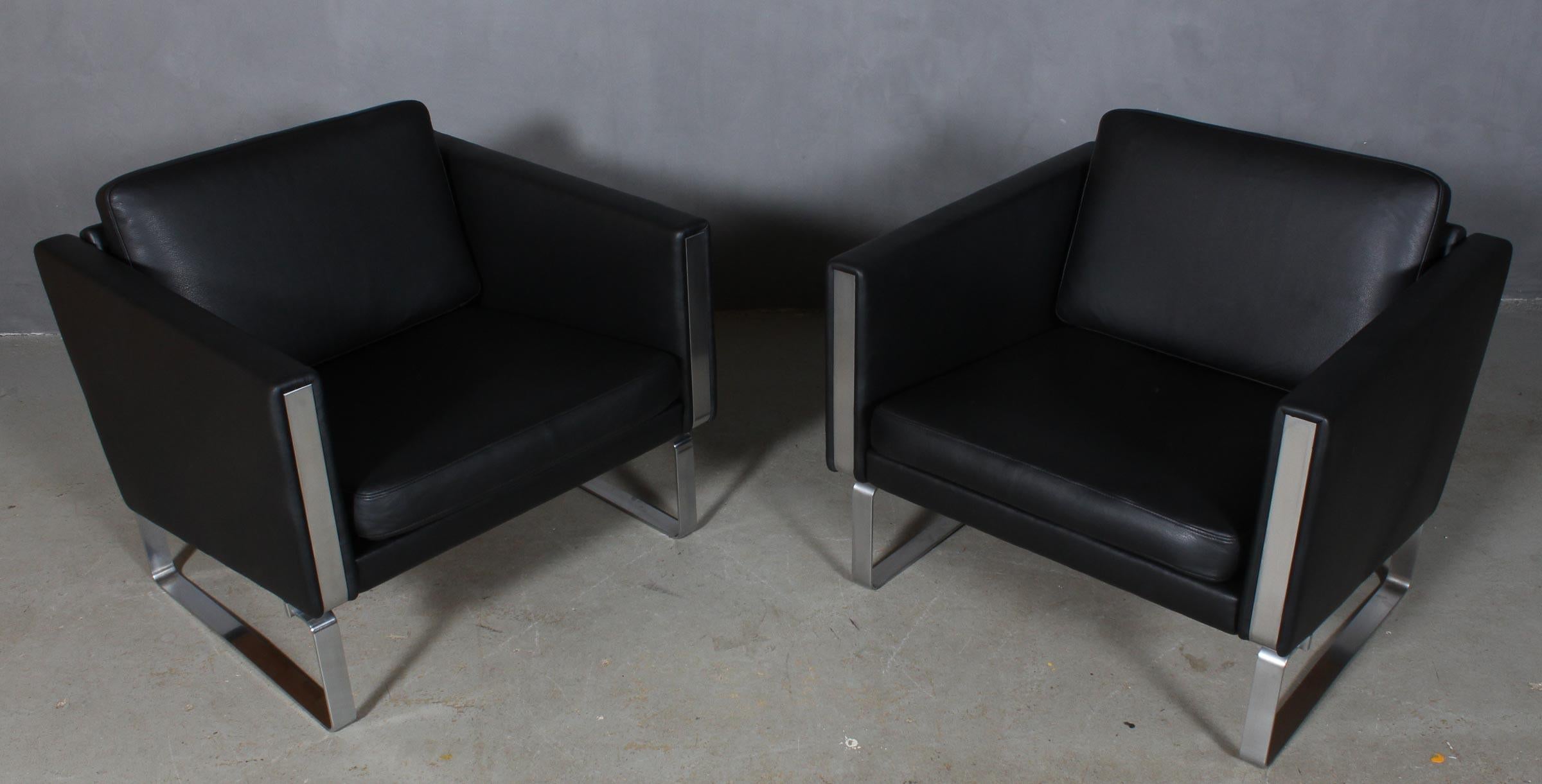 Hans J. Wegner armchair new upholstered with black aniline leather.

Frame of brushed steel

Model JH-101, made by Johannes Hansen.