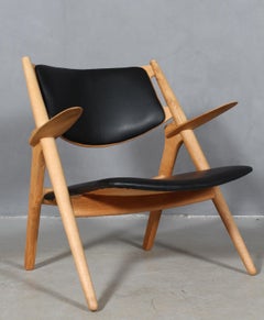 Hans J. Wegner Pair of Savbukke CH-28 Lounge Chairs