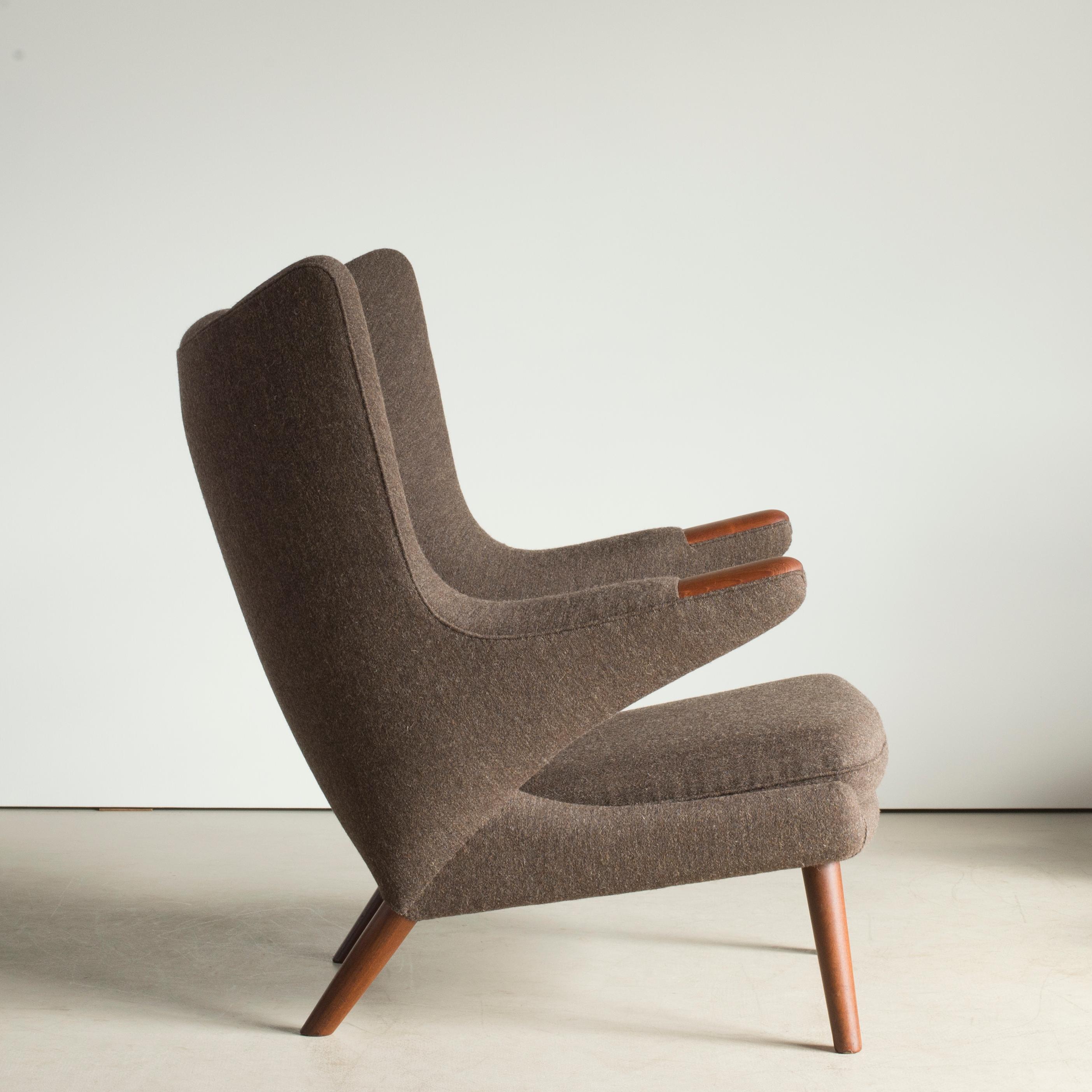 Hans J. Wegner Papa Bear chair model with Teak nails and legs. Upholstered with brown wool. Executed by A.P. Stolen, Copenhagen, Denmark.