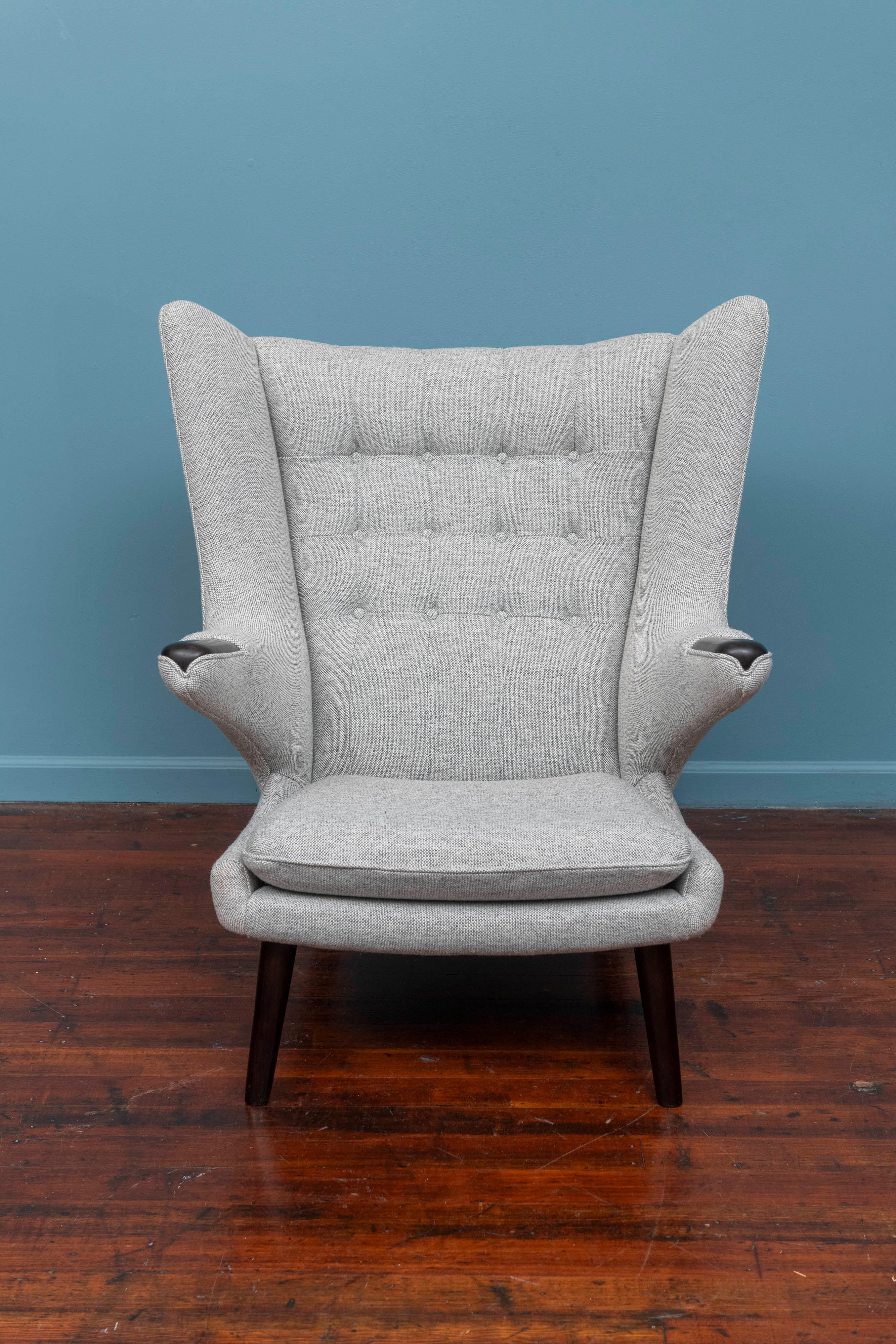 Hans J. Wegner design Papa Bear chair for AP Stolen, Denmark. Simply the most comfortable chair ever made, completely restored including refinishing, new foam, webbing and strengthening of the frame and upholstered in Maharam wool. Ready to install