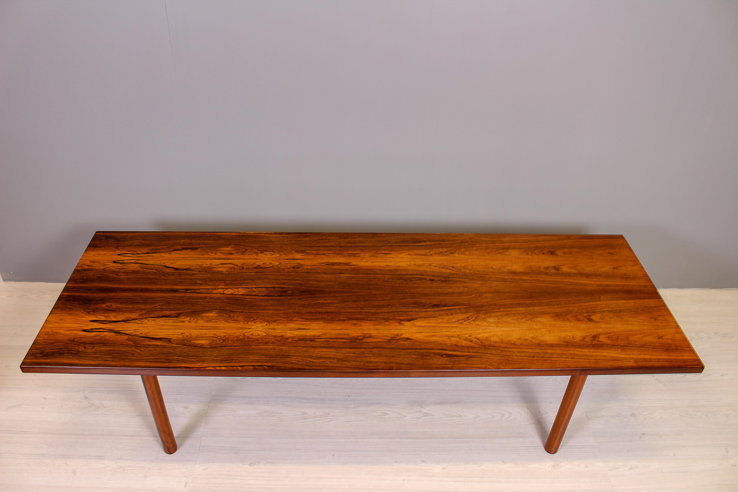 A solid rosewood coffee table by Danish designer Hans J Wenger. The model is called AT-12 and was manufactured by Andreas Tuck. Excellent vintage condition with original finish.