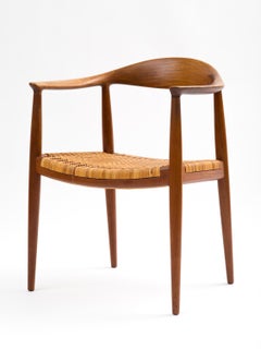 Sedia Hans J. Wegner modello JH501 in teak con seduta originale in canna