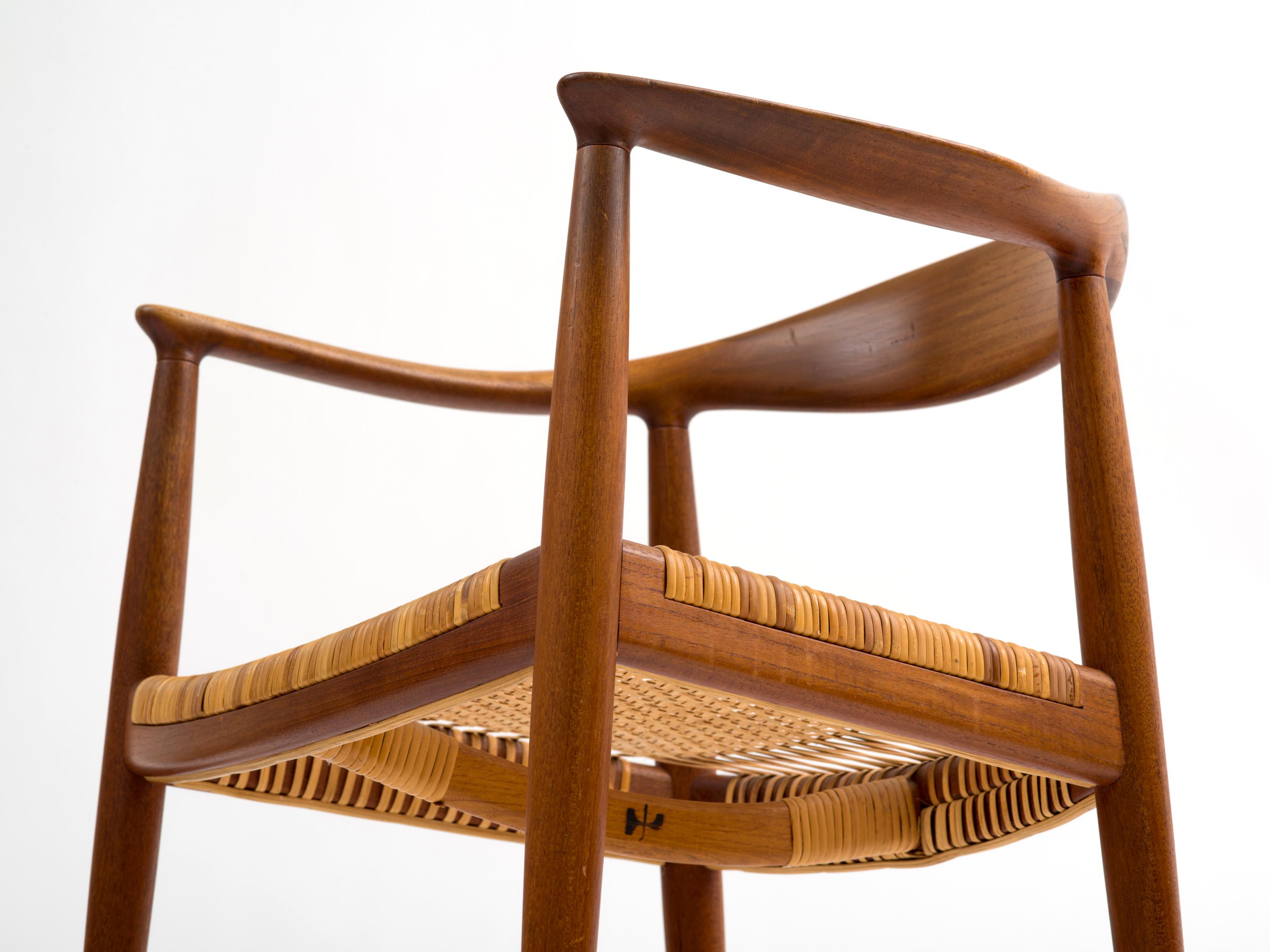 Hans J Wegner The Chair Model JH501 in Teak with Original Cane Seat  In Good Condition For Sale In Brooklyn, NY