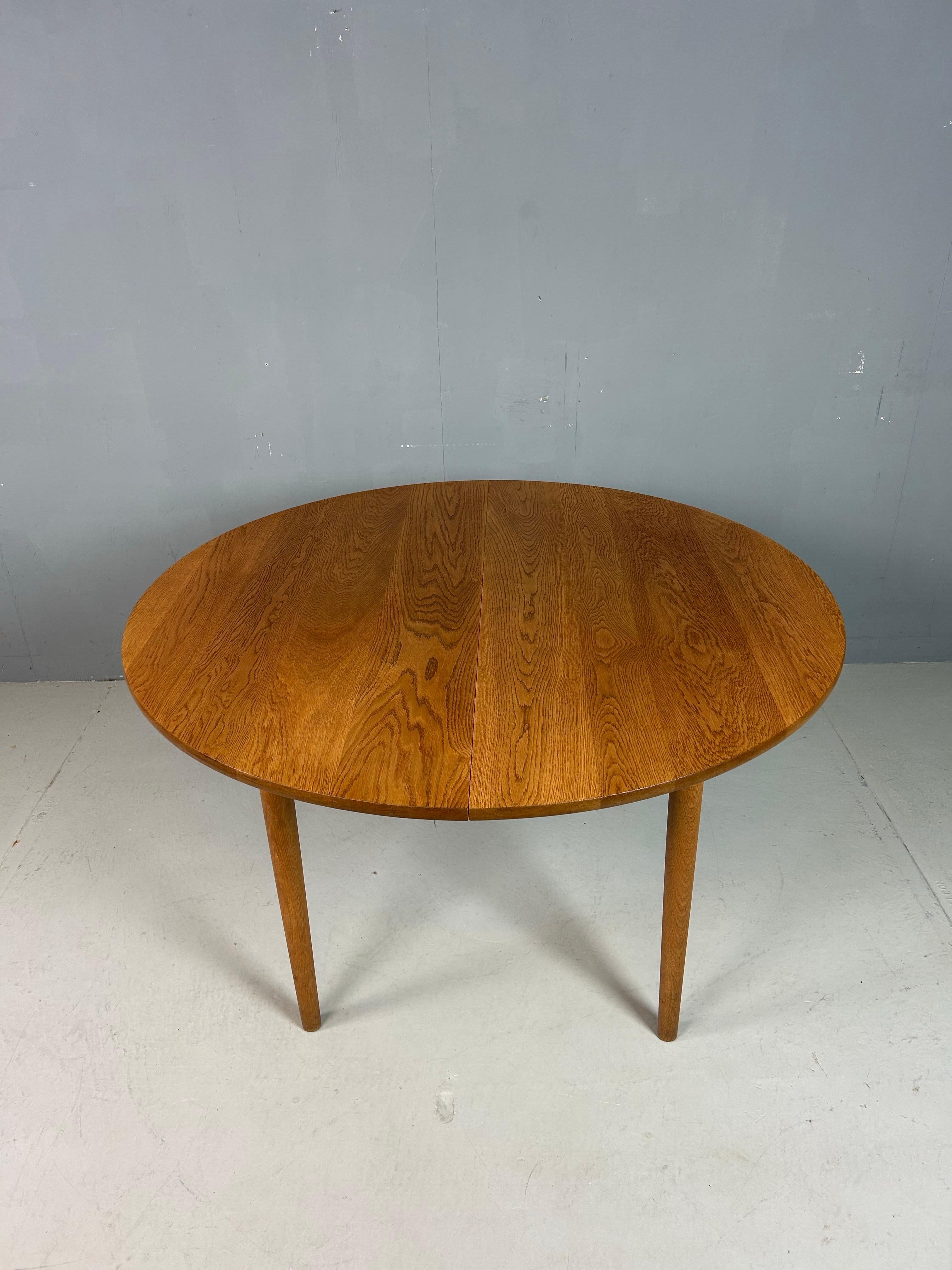 An elegant round dining table designed by Danish master Hans J. Wegner in the 1970s for Andreas Tuck. Crafted in Denmark, this table exemplifies Wegner’s signature combination of functional craftsmanship and refined organic forms.

Constructed in
