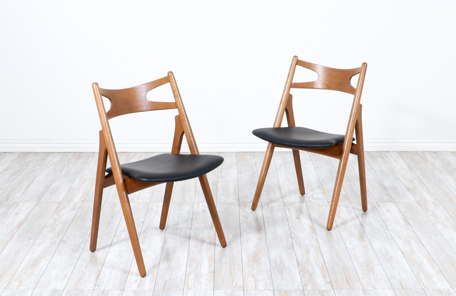 Price is for each

Iconic “Sawbuck” CH-29 Desk Side designed by Hans J. Wegner for Carl Hansen & Søn in Denmark in 1952. This chair is defined by its A-shaped frame which can be seen from the profile view. This chair is sturdily but simply