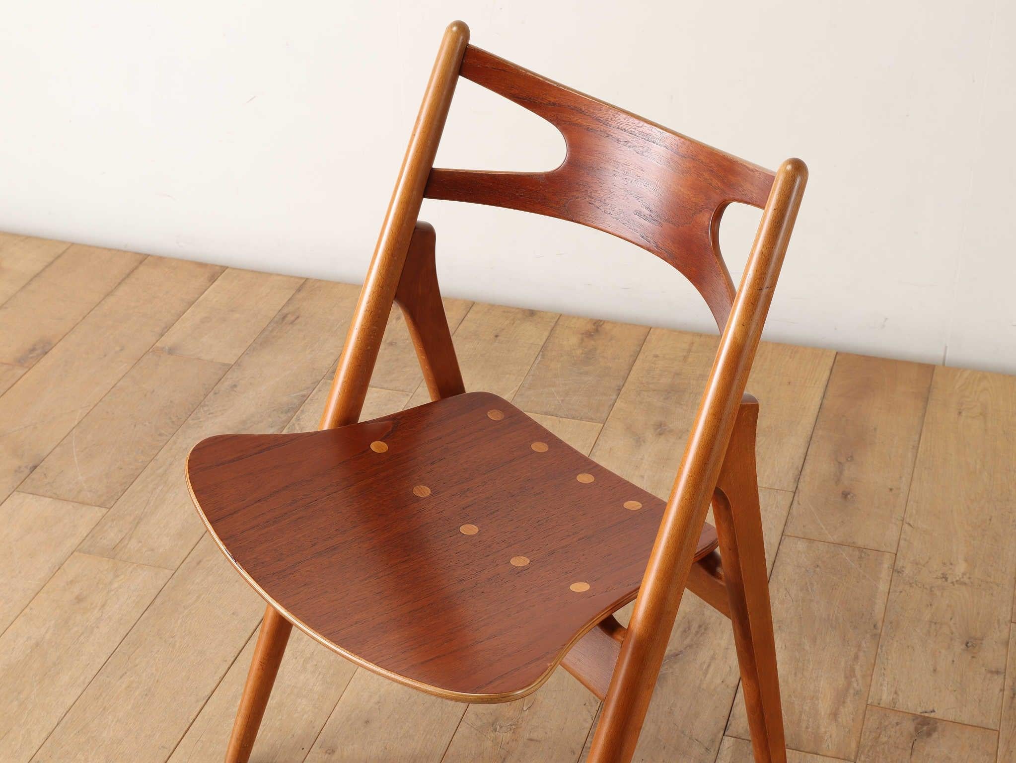 Danish Hans J. Wegner, 'Sawbuck' CH29 chairs, teak and oak, Denmark 1950s