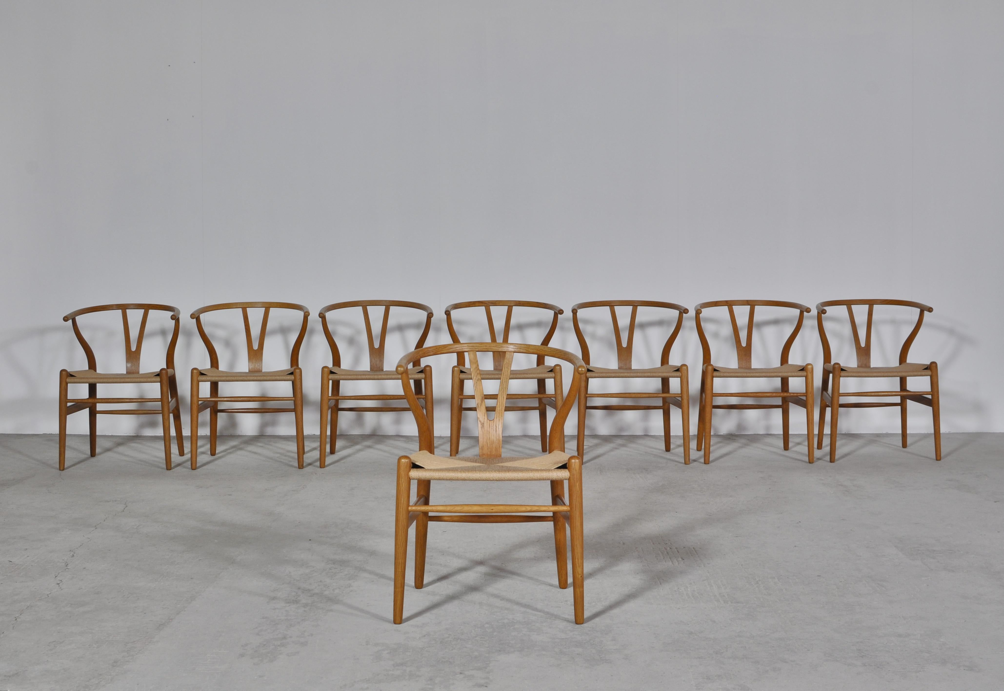 Scandinavian Modern Hans J. Wegner Set of 8 Early Stamped Carl Hansen & Sons Wishbone Chairs, 1950s