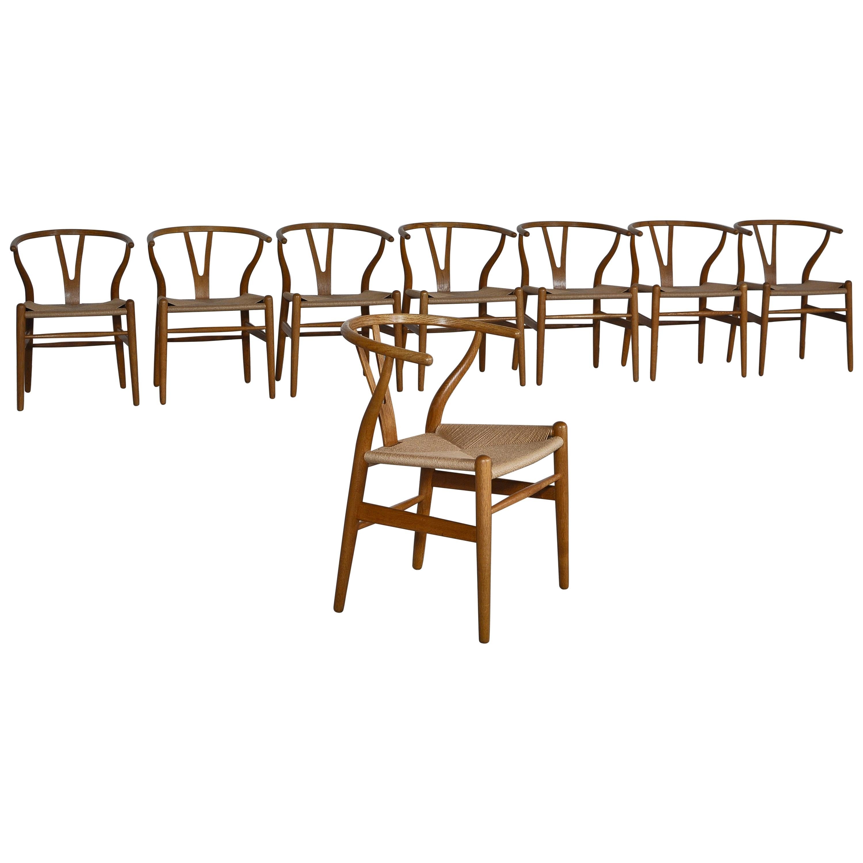Hans J. Wegner Set of 8 Early Stamped Carl Hansen & Sons Wishbone Chairs, 1950s