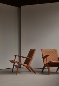 Hans J. Wegner set of Early Edition CH25 Lounge Chairs in Oak & Papercord, 1960s