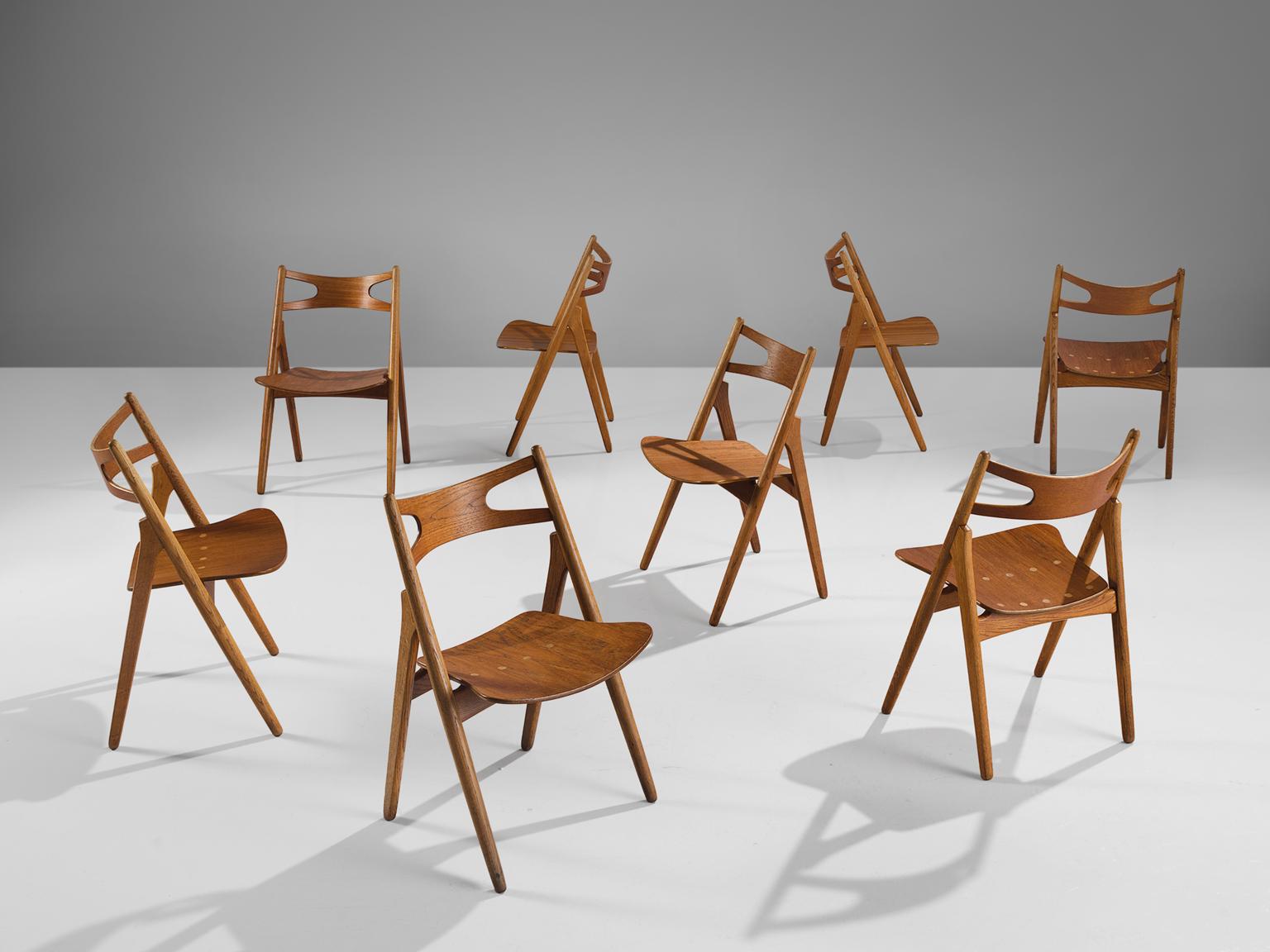 Scandinavian Modern Hans J. Wegner Set of Eight Matching Sawbuck Chairs