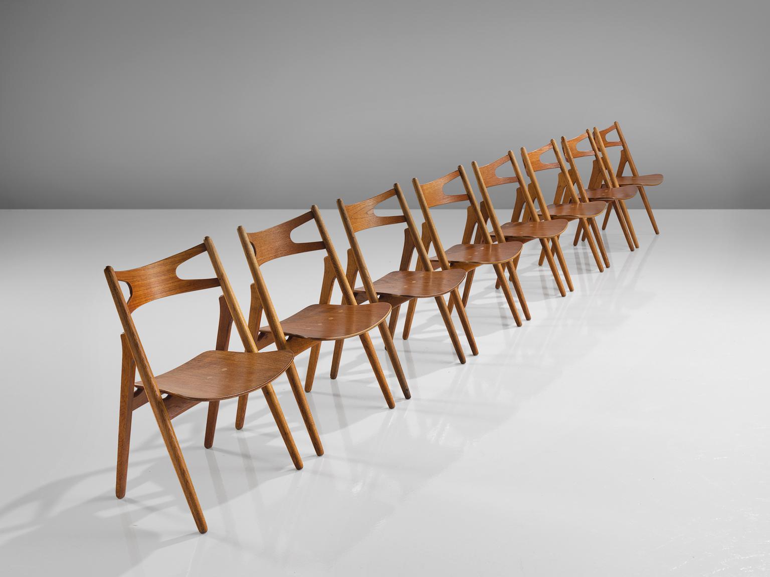 Danish Hans J. Wegner Set of Eight Matching Sawbuck Chairs