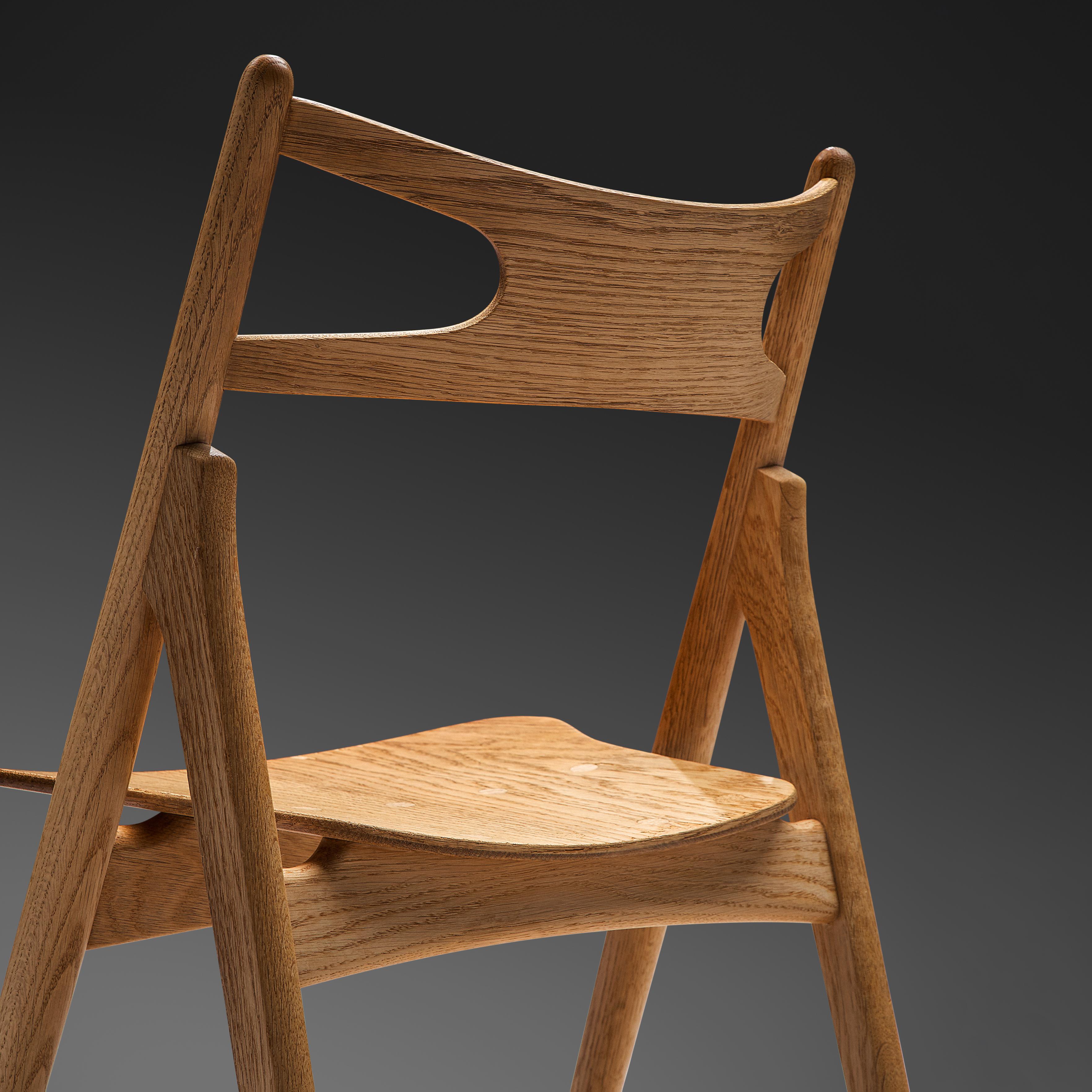 Scandinavian Modern Hans J. Wegner Set of Four 'Sawbuck' Dining Chairs in Oak  For Sale