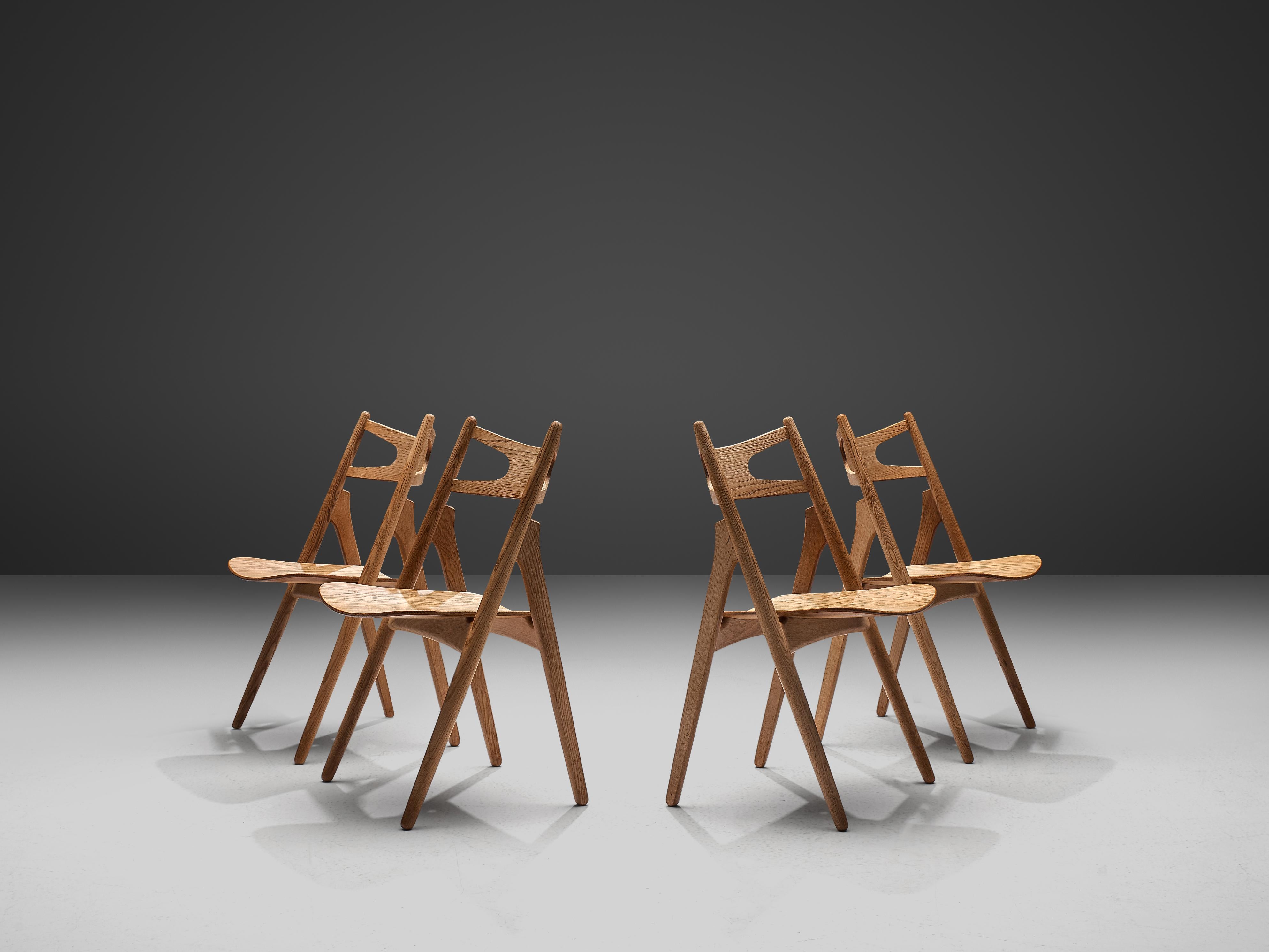 Danish Hans J. Wegner Set of Four 'Sawbuck' Dining Chairs in Oak  For Sale
