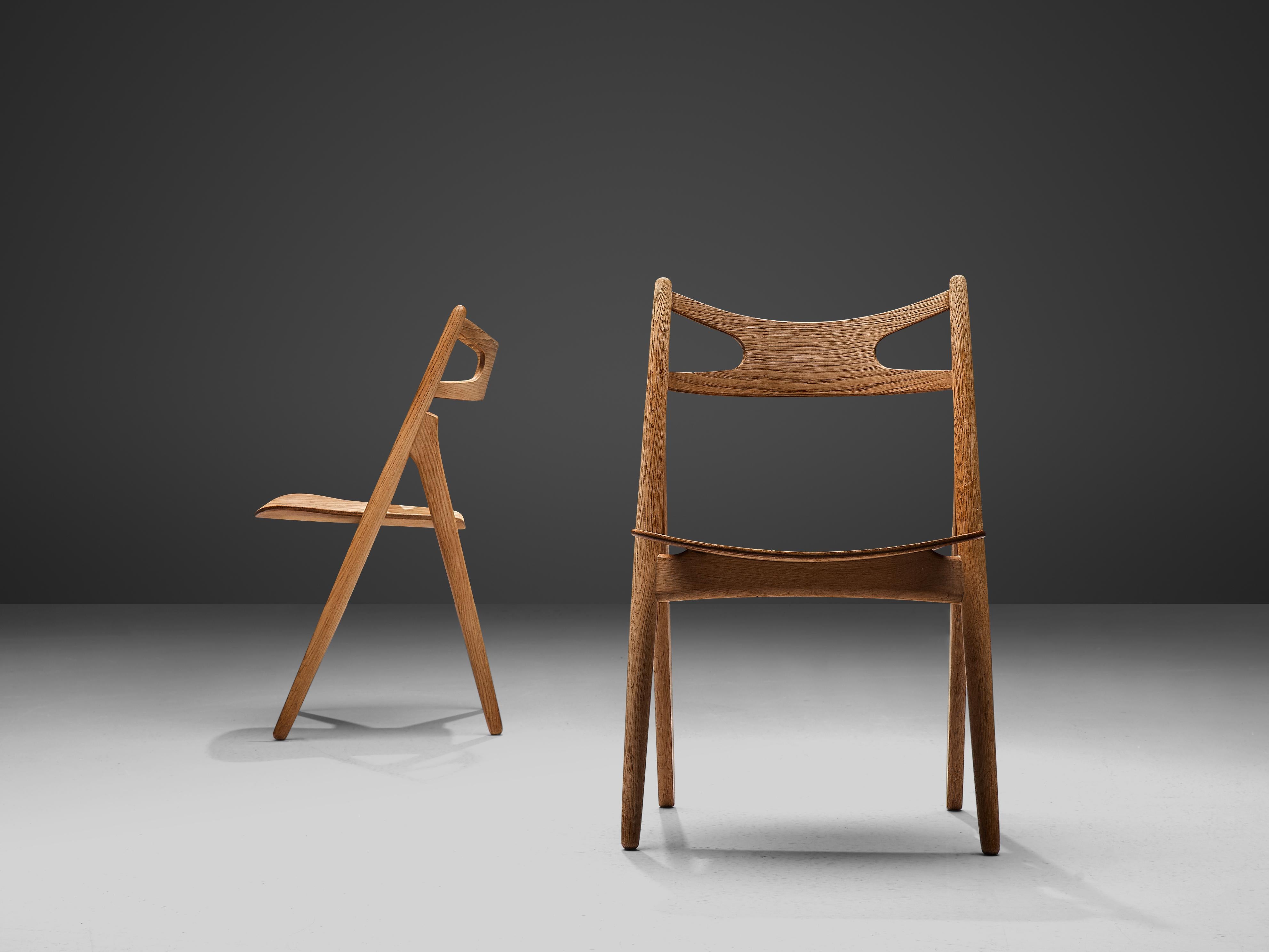 Mid-20th Century Hans J. Wegner Set of Four 'Sawbuck' Dining Chairs in Oak  For Sale