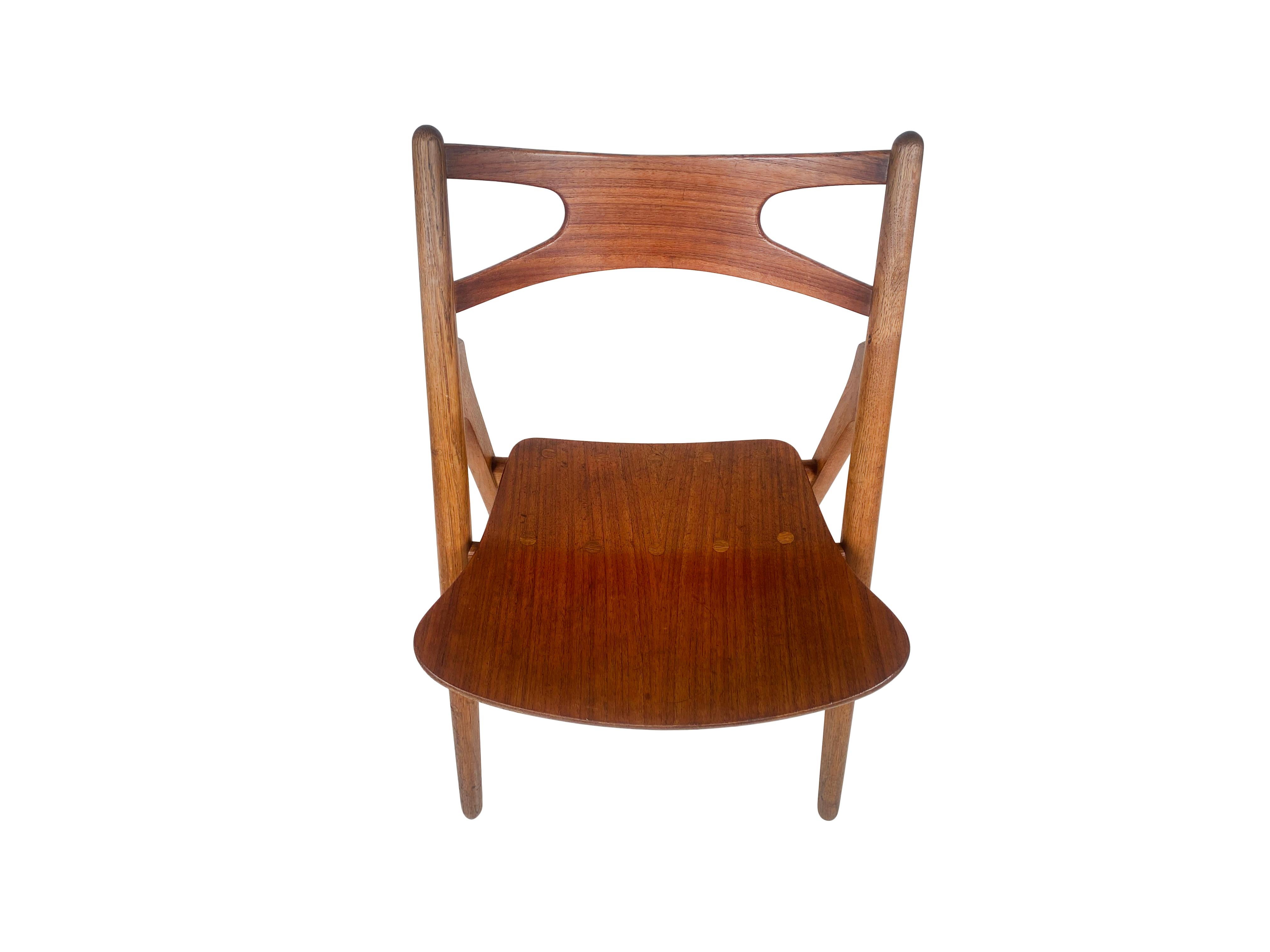 Oak Hans J. Wegner, set of four 'Sawbuck' CH29 chairs, teak and oak, Denmark 1950s